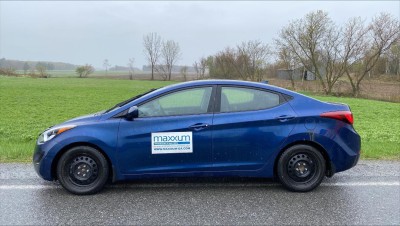 V�hicules avec des enseignes de Maxxum Gestion d'Actifs